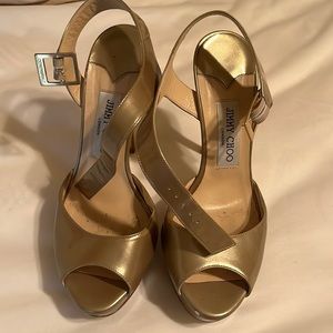 Jimmy Choo gold shoes.